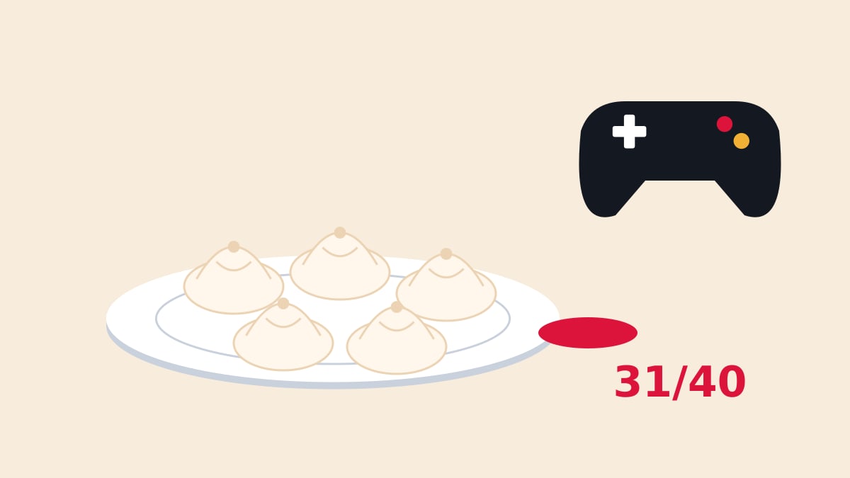 Illustrated plate of momos next to a game controller